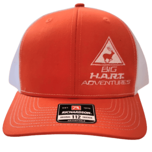 Image of orange and white trucker hat