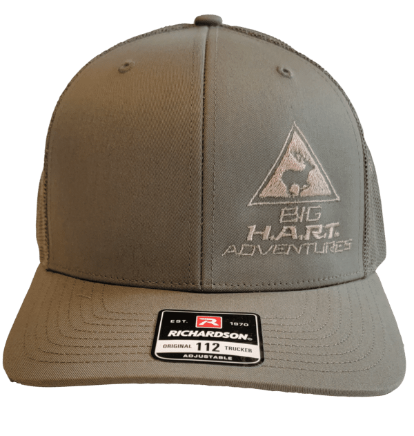 Image of olive trucker hat with Big H.A.R.T. Adventures logo